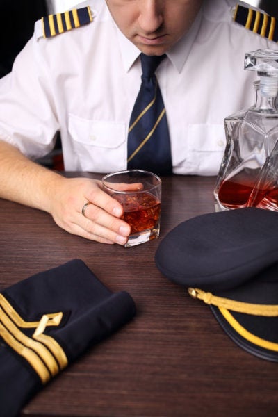 Pilot who was under the influence of alcohol 