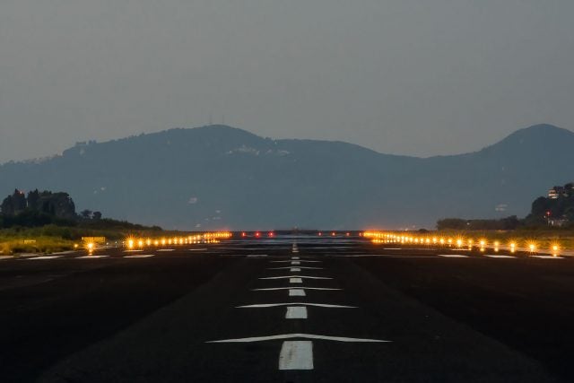 Airplane runway in the dark.