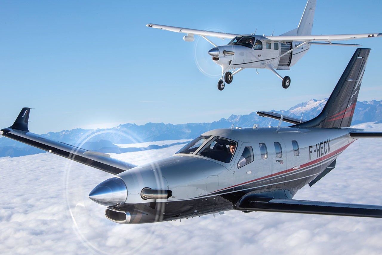 The Daher TBM 940 and Kodiak in formation, showing off the differences and similarities between the two single-engine turboprop beauties. Daher expects to make further refinements to the Kodiak over time. 