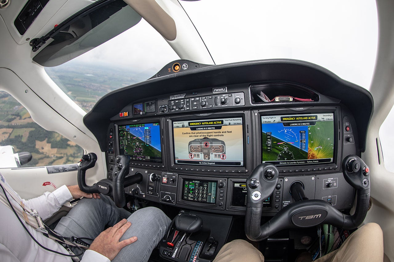 Hands in the lap, Daher's demonstration pilot lets HomeSafe do all the work.