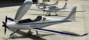 This artist's rendition shows Sun Flyer with wings equipped with solar cells to aid battery recharging.