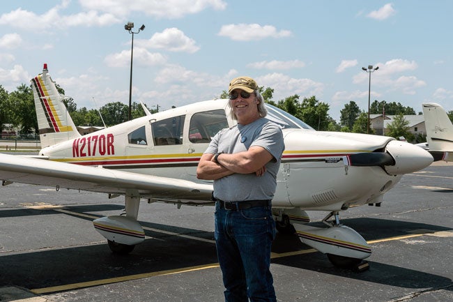 Owner with airplane