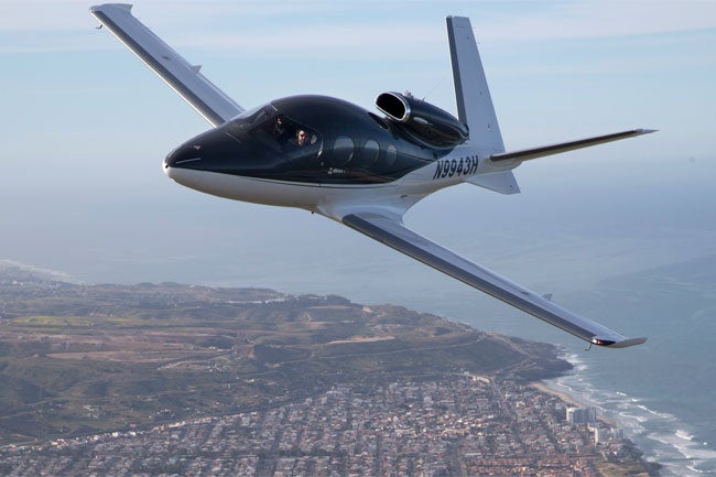 Cirrus SF50 Vision Jet over the coast