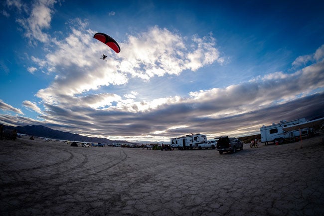 A powered parachute flying at the High Sierra Fly-In