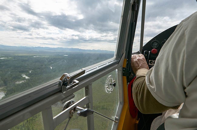 Glass door on the left side of a Super Cub.
