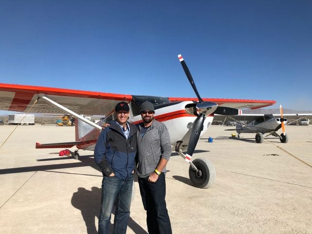 Marc Ausman and Rob Dehoney in front of Cessna 185