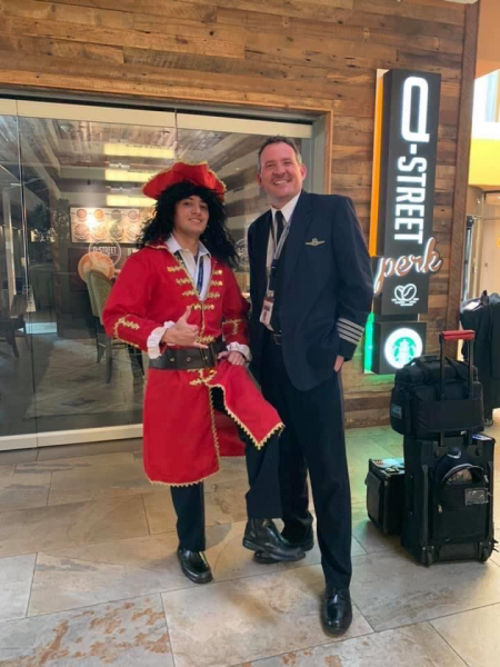 A pilot dressed as Captain Morgan on his company's last day.