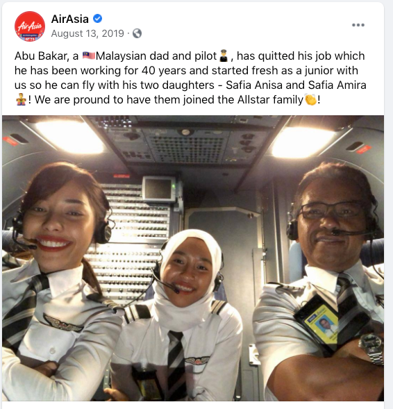 Abu Bakar flying with his daughters, Safia Anisa and Safia Amira, who are AirAsia first officers.