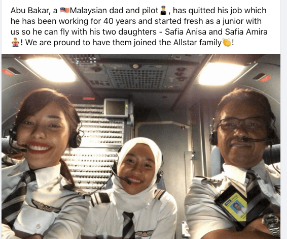 Abu Bakar flying with his daughters, Safia Anisa and Safia Amira, who are AirAsia first officers.