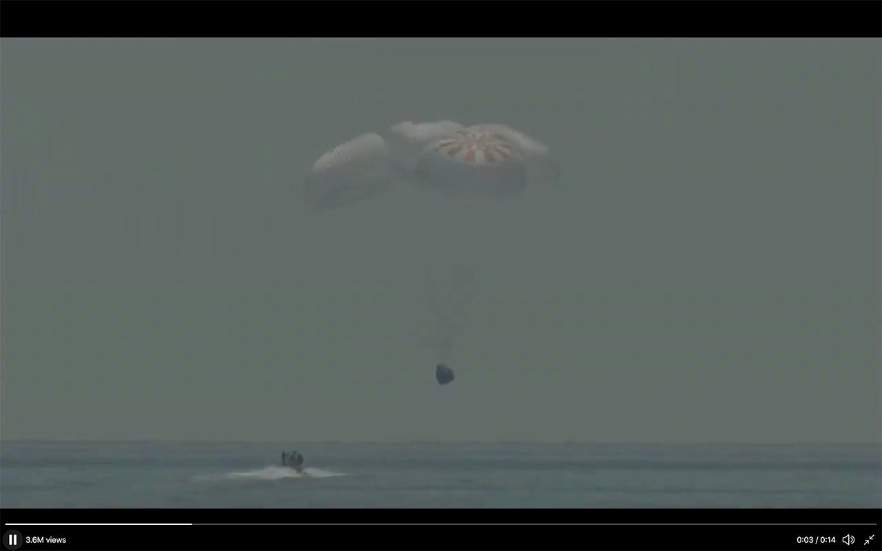 A screencap of the SpaceX Dragon crew landing back on earth.