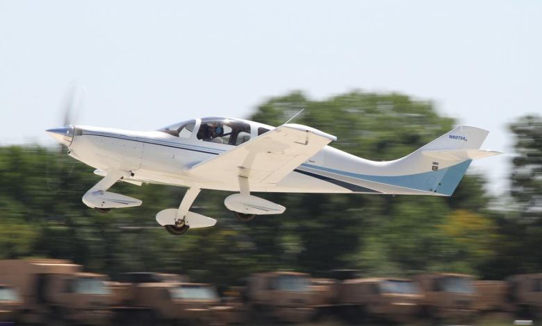 A Wheeler Express composite kit plane taking off at Oshkosh.