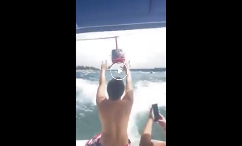 Helicopter Buzzes Boaters At Trump Parade