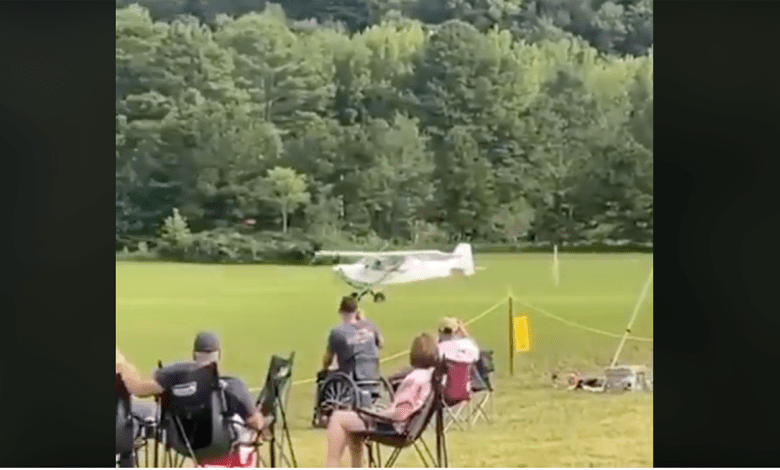 Screencap of a taildragger flying without a tailwheel.