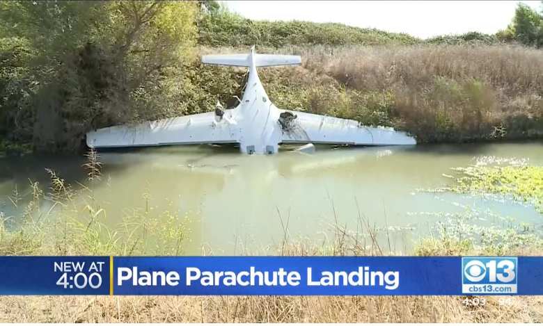 A screen capture from CBS Sacremento's coverage of a Cirrus that went down in California under its CAPS whole-airplane recovery parachute.