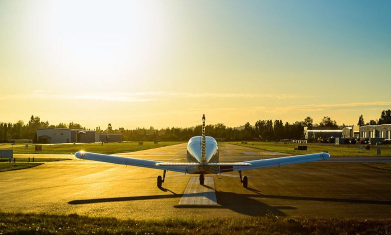 Small airplane at sunset
