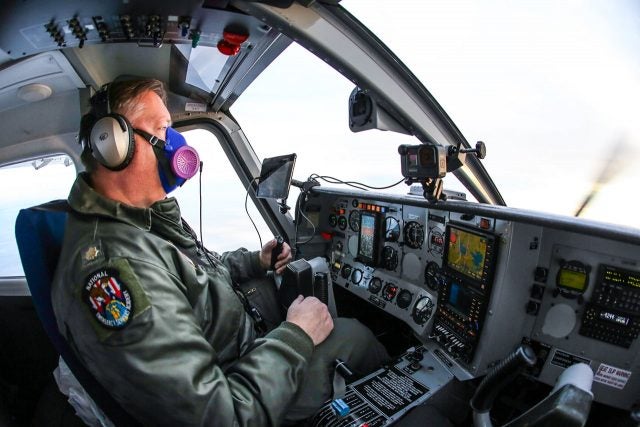Pilot Rod Racic at the controls of the CAP Gippsland GA-8 on the mission to deliver vaccine in the upper Midwest.