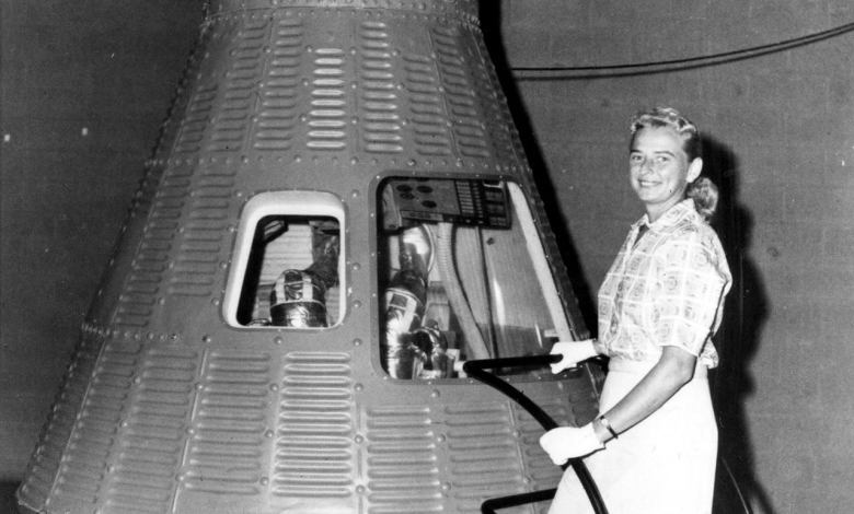 Jerrie Cobb in a publicity photo shoot with a space capsule.