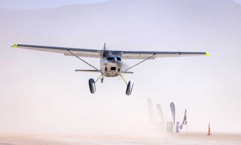 A Cessna 180 makes a low pass during the tenth High Sierra Fly-In. Photo by Jim Raeder