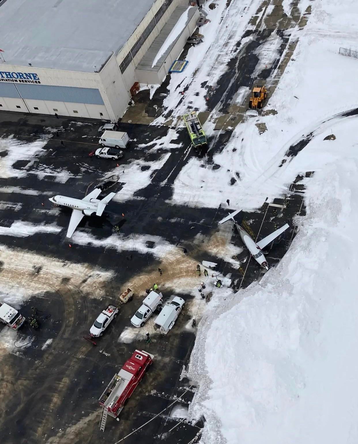 Video footage shows a Pilatus PC-12 crash into a Hawker jet while on the ground.