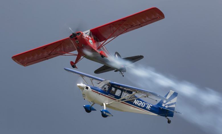 Erik Edgren in his Decathlon and and R.J. Gritter in his clipped-wing T-Craft showed that slow and gentle can be very entertaining! Photo by Jim Koepnick