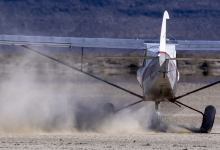 A CubCrafters NX Cub is at home on a dry lake bed. Photo by Jim Raeder.