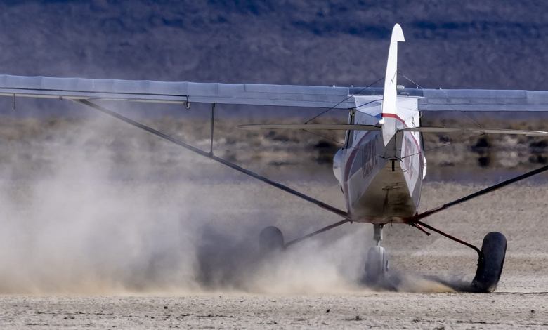 A CubCrafters NX Cub is at home on a dry lake bed. Photo by Jim Raeder.
