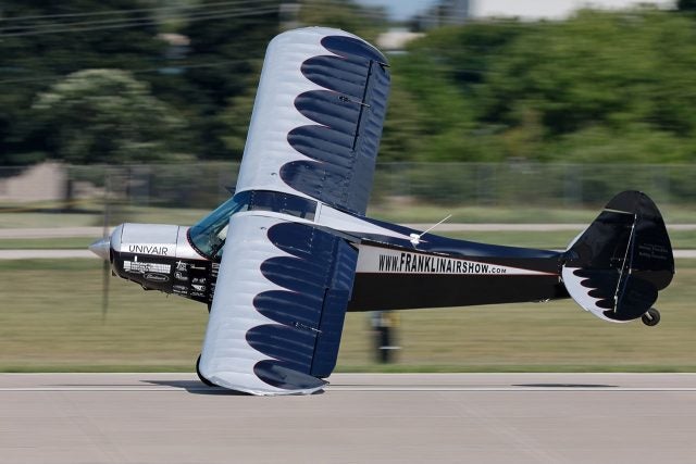 Kyle Franklin Cub in wild aerobatic performance. - Oshkosh AirVenture Tuesday 2022