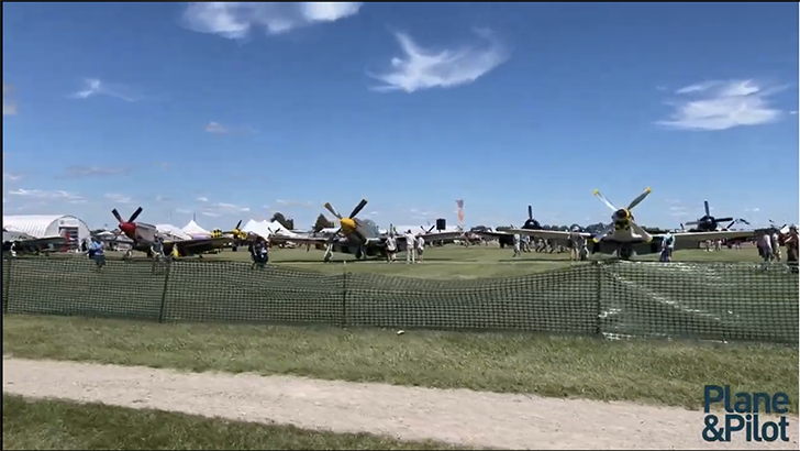 Video: Crooners, Fly Bys, Bagpipes and Gooney Birds at Oshkosh 2022