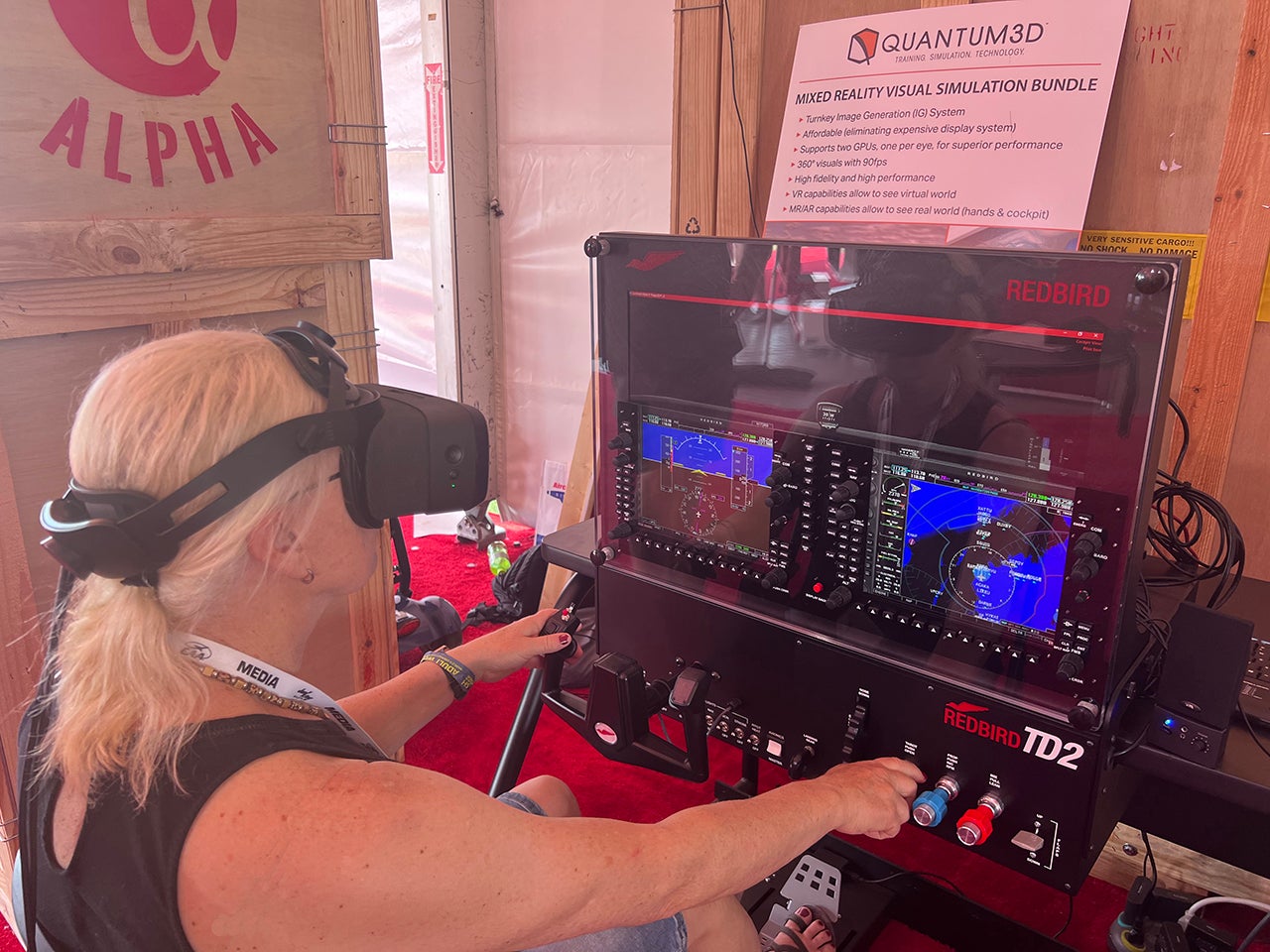 Plane & Pilot's Editor-in-Chief Isabel Goyer trying out Redbird’s Mixed-Reality Simulator.