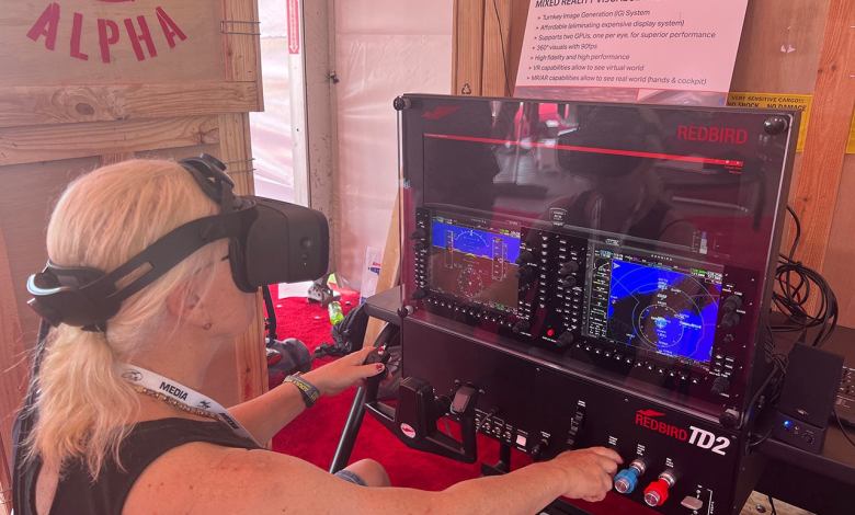 Plane & Pilot's Editor-in-Chief Isabel Goyer trying out Redbird’s Mixed-Reality Simulator.