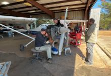 Mechanics work on a Cessna 182. Photo by Cayla McLeod.