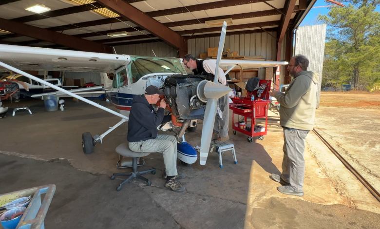 Mechanics work on a Cessna 182. Photo by Cayla McLeod.