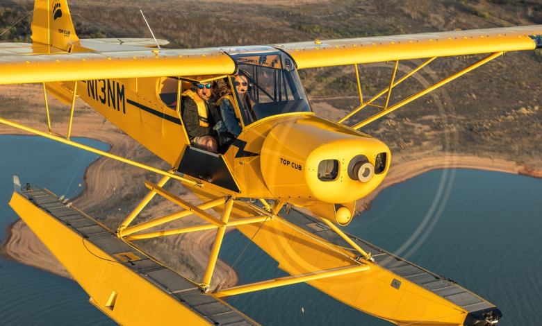 Cayla McLeod pilots a TopCub on floats. Photo by Jack Fleetwood.