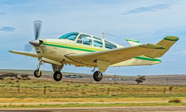 Beechcraft Bonanza taking off into a climb