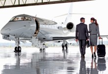 Executives board jet [Shutterstock]
