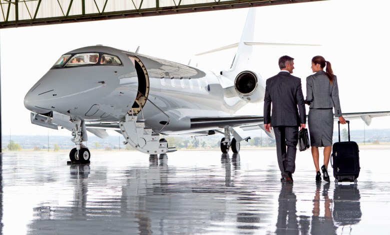 Executives board jet [Shutterstock]
