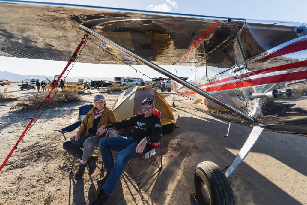 Nick and Megan Beamer flew their polished Cessna 170 into High Sierra from Yuba City, California. Enthusiastic pilots proudly display their American spirit across the playa. [Credit: Cayla McLeod]