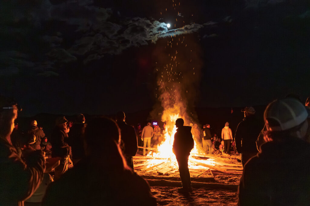 There's a large campfire every night for attendees of the High Sierra Fly-In. It's easy to make new friends and discuss a shared passion for backcountry aviation. [Credit: Ryan Cleek]