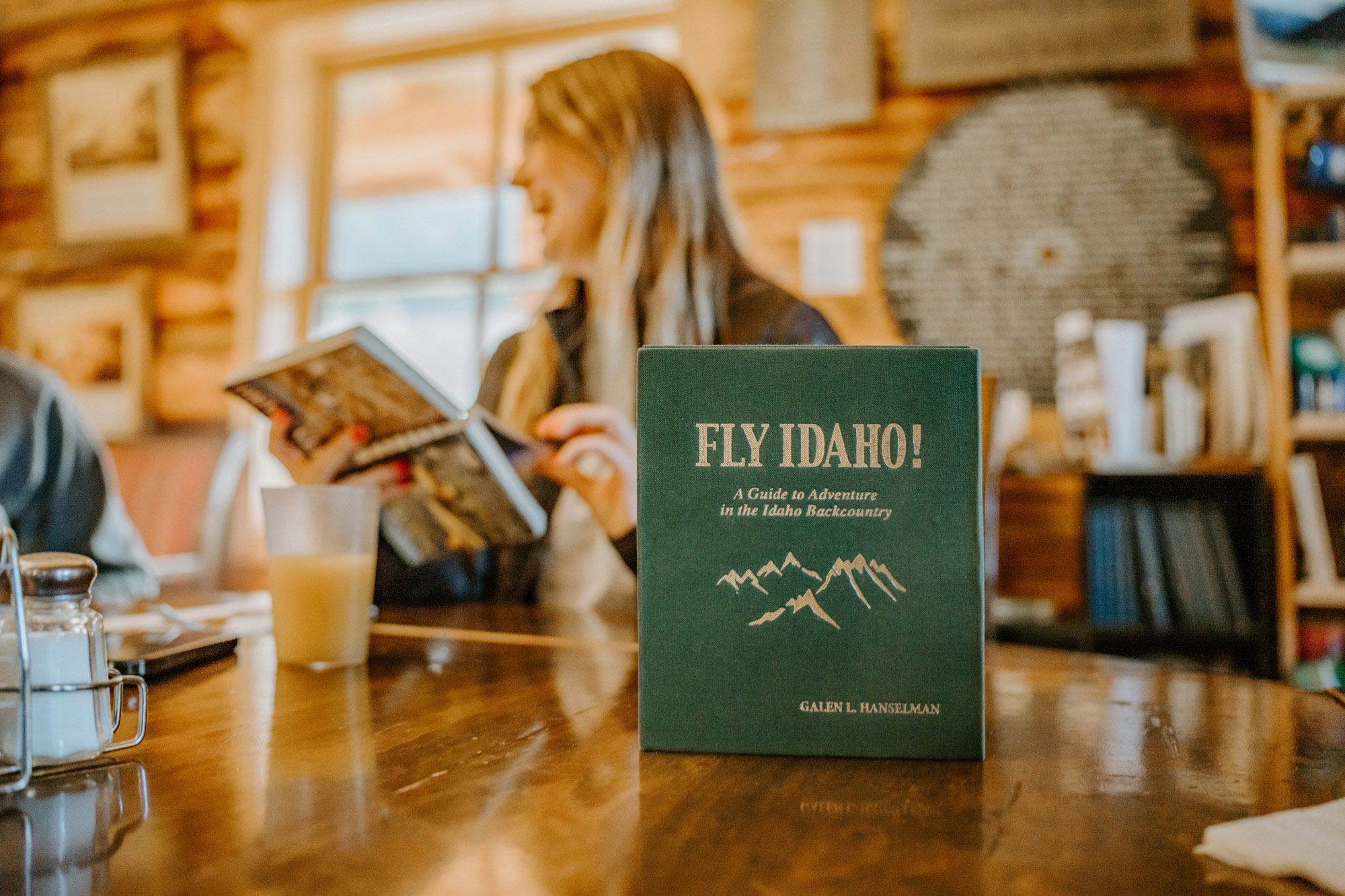 Known as the backcountry bible, "Fly Idaho" helps pilots navigate the state's aviation landscape. [Credit: Jordan Lefler]