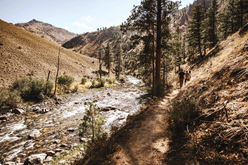 Venturing to Lower loon's hot spring is a scenic treat. The trail, flakned by the Salmon River is a short walk south of the runway. [Credit: Jordan Lefler]