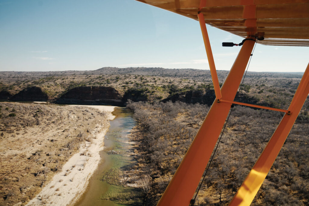 Everything is bigger in Texas, inlcuding the burrs. Bluffs along the Llano River offer pilots a scenic view.
