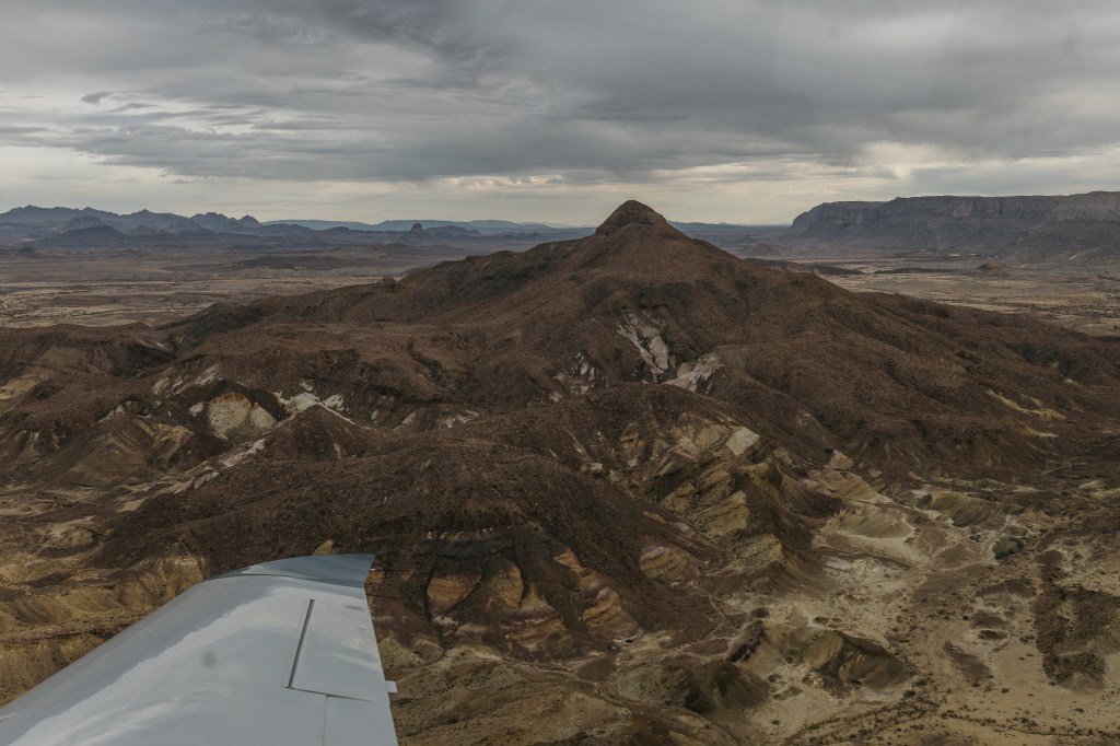 A Cirrus SR20 flies over Big Bend National Park in far West Texas. [Credit: Hannah Gentiles]