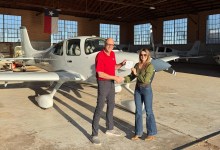 DPE Will Strieder and the author pose after her check ride at Lubbock Preson Smith International Airport (KLBB) in Texas. [Credit: Cayla McLeod]