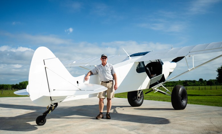 Florida native Chuck Kinberger poses with his CubCrafters FX-3 Carbon Cub on 35-inch Alaskan Bushwheel tires. [Credit: Jon Whittle]