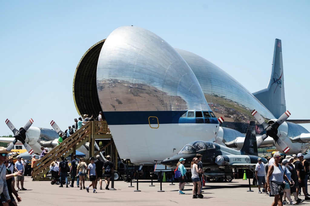 NASA’s Super Guppy and an A-10 Warthog are common occurences during the annual Sun ‘n Fun Aerospace Expo in Lakeland, Florida. Pull-up challenges are also an everyday sight at the airshow. [Credit: Jon Whittle]