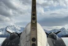 An abandoned Douglas DC-3 overlooks the mountains at Palmer Municipal Airport (PAAQ). [Credit: Cayla McLeod]