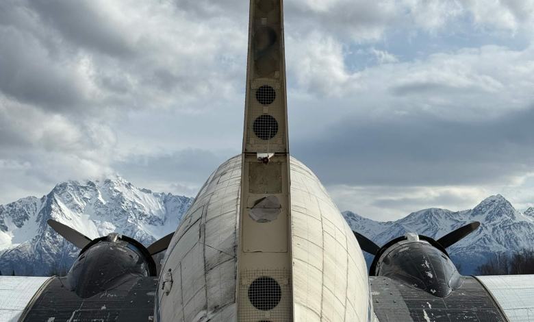 An abandoned Douglas DC-3 overlooks the mountains at Palmer Municipal Airport (PAAQ). [Credit: Cayla McLeod]