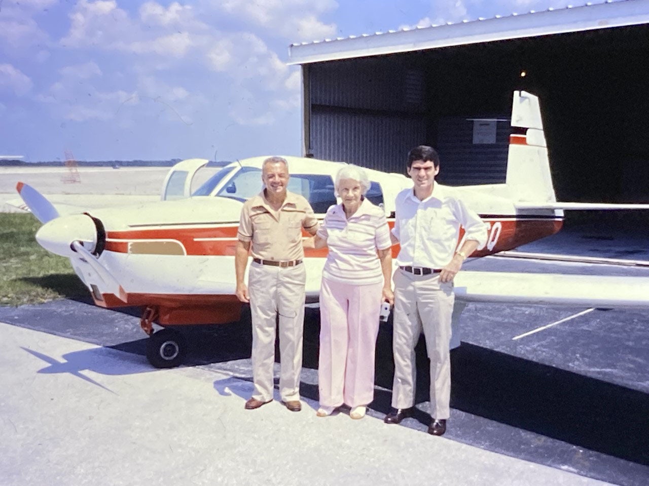Jeremy King's late friend Chris Smisson at right, with Roswell and Maude Mathis back in 1980 when they sold Smisson their beloved Mooney. The Mathises' son, Paul Mathis, saw a photo of his parents in our September 2019 issue and reached out to King.