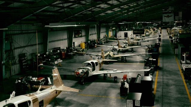The Mooney factory assembly line in Kerrville, Texas, from years back. - Mooney Re-Opens for Business, Kind Of