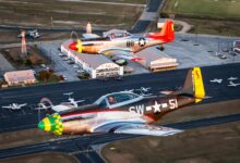 ScaleWings’ SW-51 Mustangs power their way over Gillespie County Airport in Fredericksburg, Texas. [Credit: Glenn Watson]